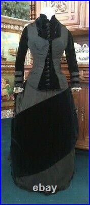 #21-095, Elegant 1870's 2pc Black Silk and Navy Velvet Bustle Gown Fan Pocket