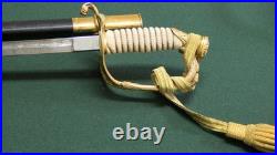 U. S. Navy Officer's Dress Sword in Scabbard with Engraved Blade with belt