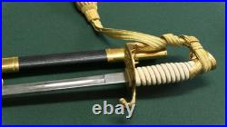 U. S. Navy Officer's Dress Sword in Scabbard with Engraved Blade with belt
