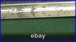 U. S. Navy Officer's Dress Sword in Scabbard with Engraved Blade with belt