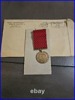 WW1 Vintage, Named, US Navy Good Conduct medal. 1935